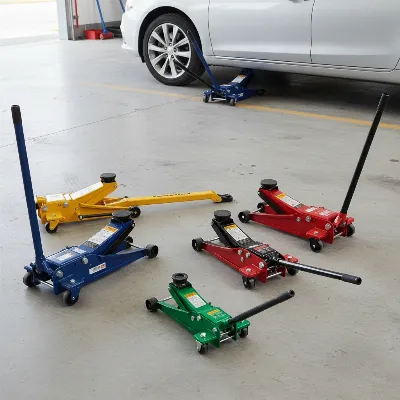 A selection of affordable hydraulic floor jacks under $100 in a clean garage setting with a car partially lifted.