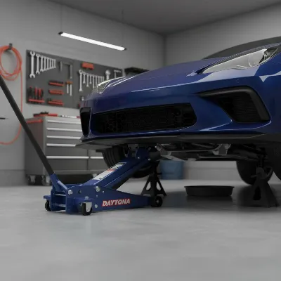 Daytona 3 Ton Low Profile Floor Jack lifting a sleek sports car safely